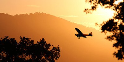 Airplane at sunset