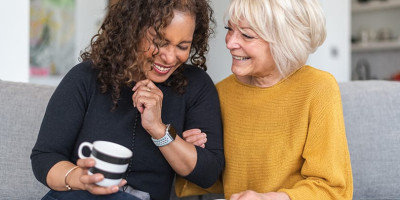 two women laughing