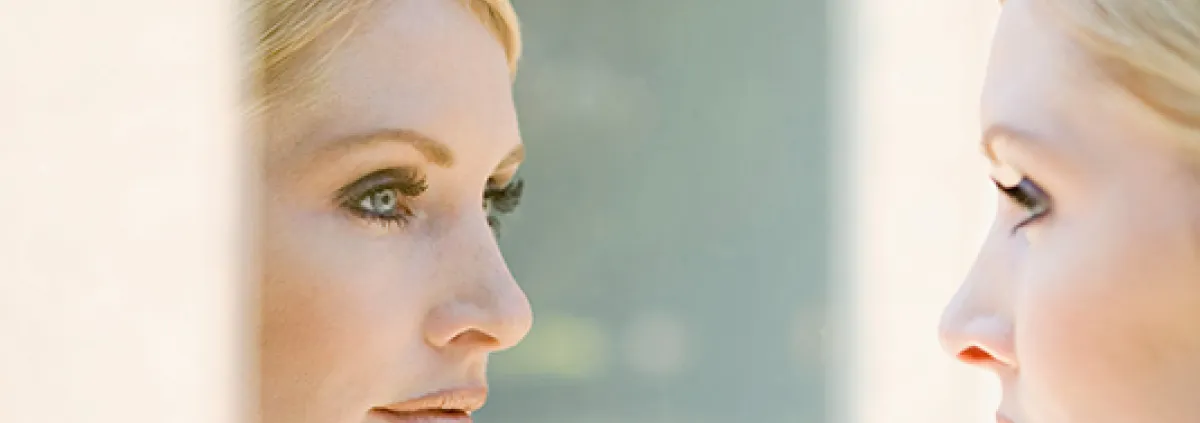 woman's face in the mirror