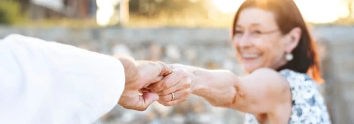 couple reaching to each other