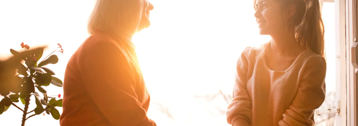 Mom and daughter in sunlight