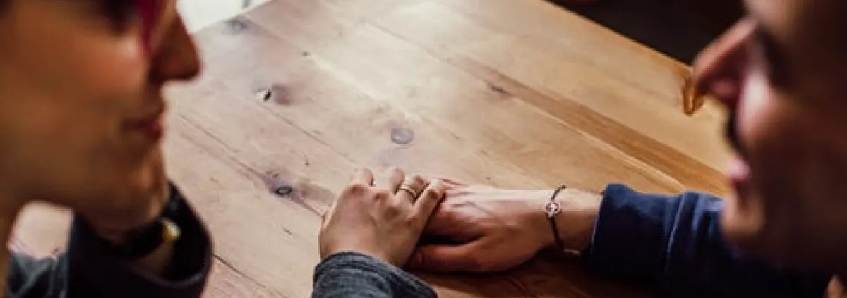 a couple holding hands