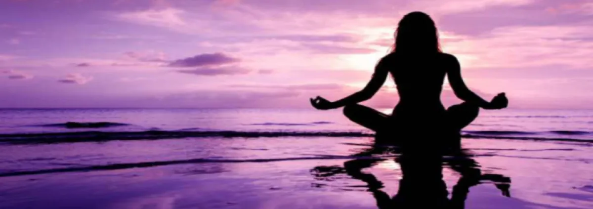 woman meditating on the water